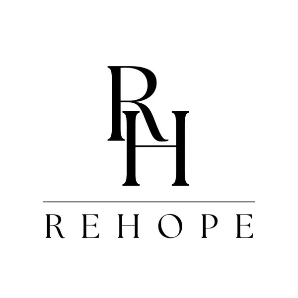 REHOPE nonprofit partner logo for human trafficking survivor services, trauma-informed care, and residential recovery programs
